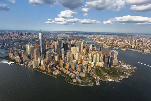 Aerial view of Manhattan showcasing iconic skyline and urban landscape, representing security guard services in NYC