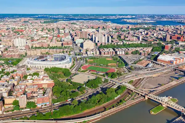 Aerial view of The Bronx showcasing urban landscape and neighborhoods, highlighting security guard services in NYC